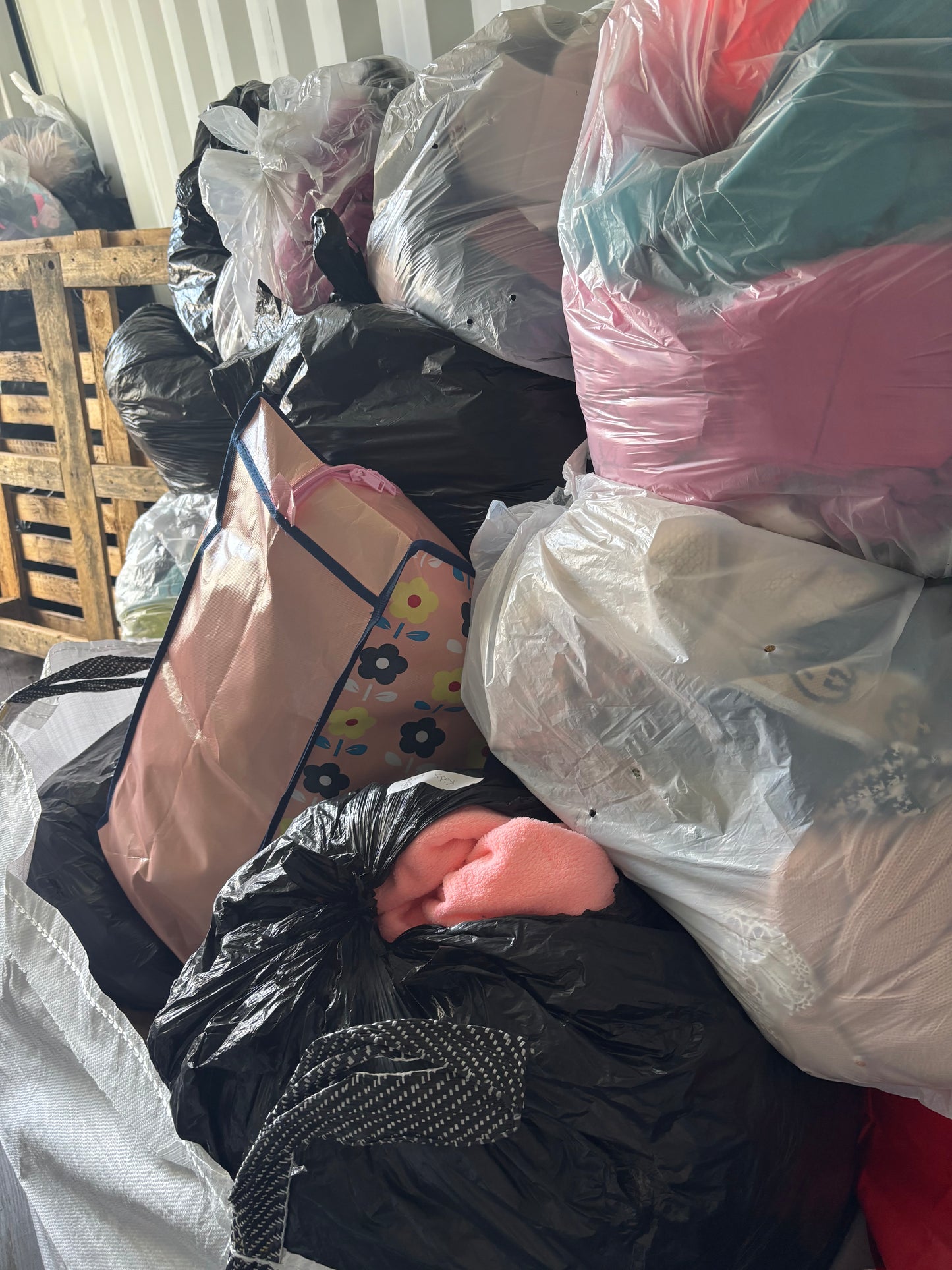 Unsorted bundles of clothes